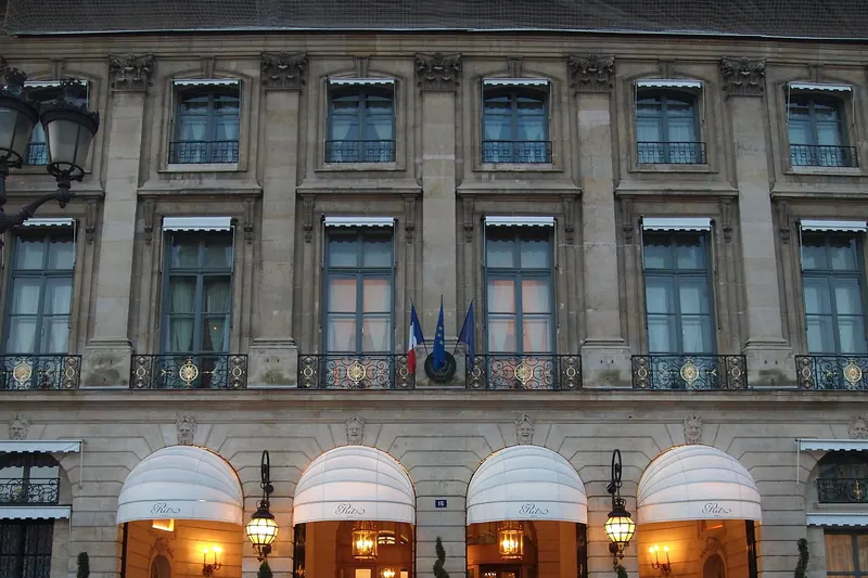 Ritz Paris: the façade and awnings on Place Vendôme at dusk